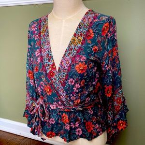 Misses blouse. Cute floral print on green background. Size large.